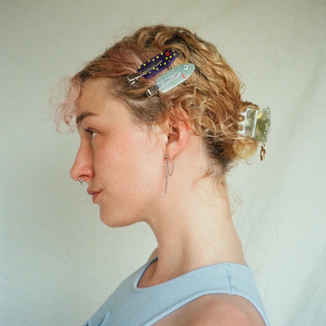 Set of colorful hair clips on a blue card with 'Hey Ricochet' branding.