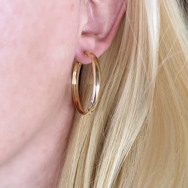 Hollow Continuous Hoop Earrings on 