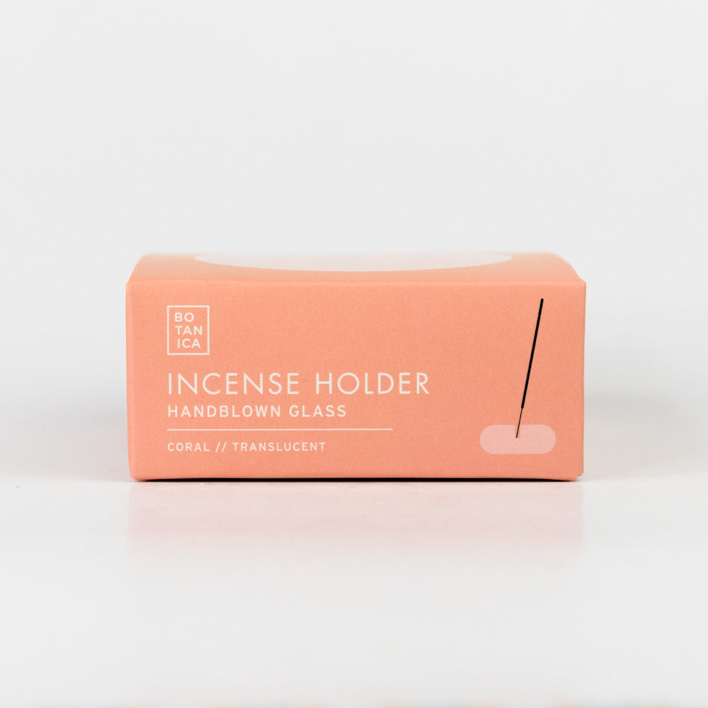 Coral incense holder packaging with a single incense stick on a white background