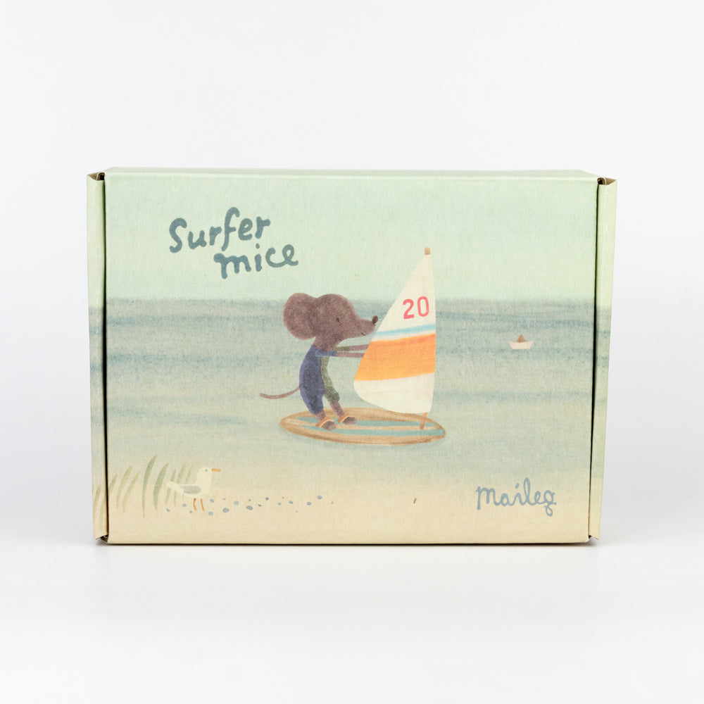 Stuffed mouse with a sailboat on a white background