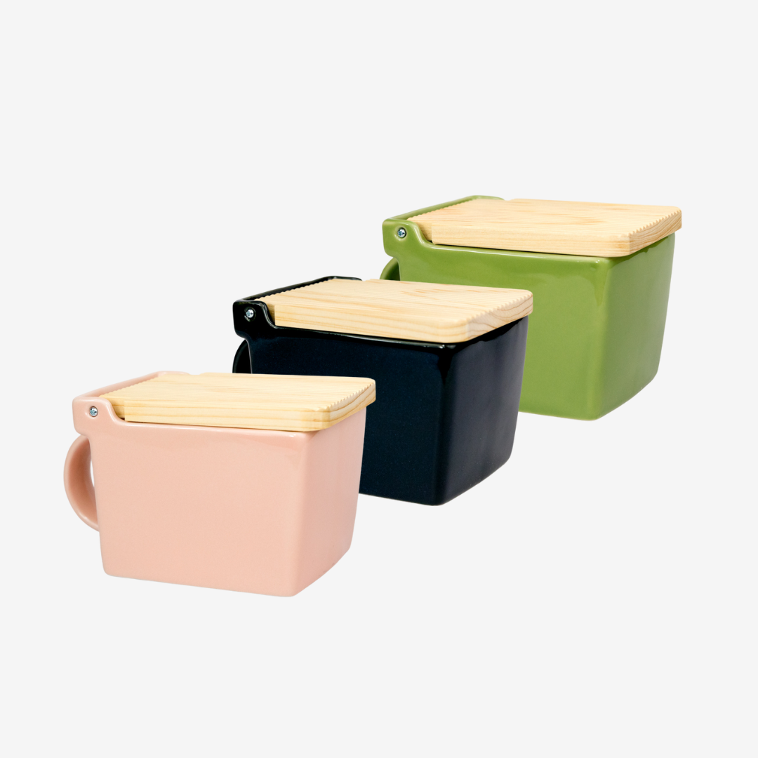 Zero Japan Saltboxes in (top to bottom, left to right) Carrot, Blueberry, Matte Black, White, Banana, Tomato