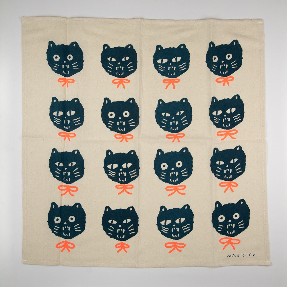 Packaged product with black cat illustration and 'Nice Life' text on a beige background