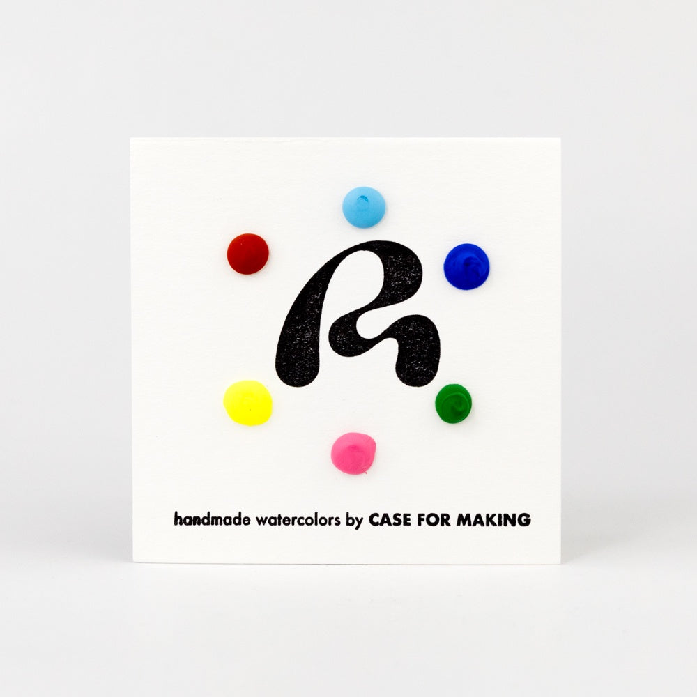 Card with colorful watercolor dots and a black logo on a white background, featuring 'handmade watercolors by CASE FOR MAKING'.